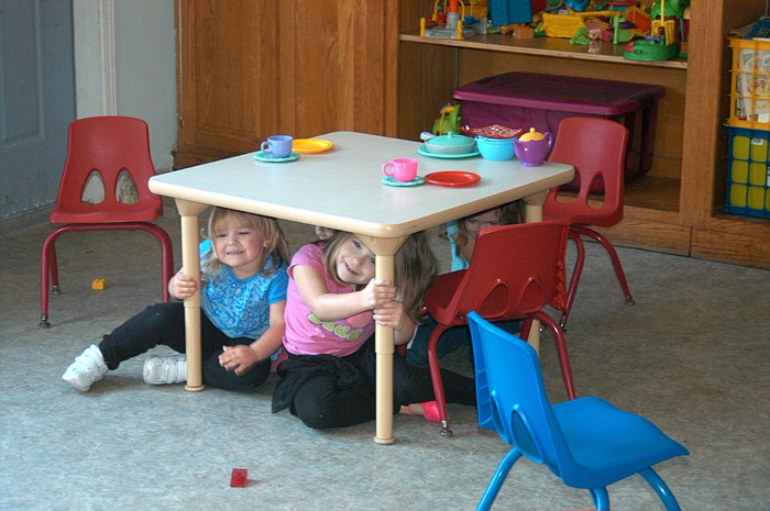 The youngsters at Kid's World Child Development Center, California, participate in the emergency earthquake drill, called the Great Central U.S. Shakeout. The scheduled drill occurred at 10:15 a.m. Thursday, April 28. The New Madrid Earthquakes hit in 1811-12.