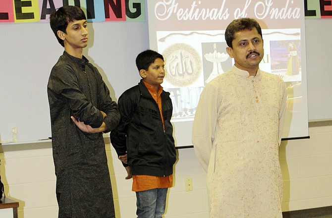 Dhimand Upanhyay, president of the Vichved Foundation, explains the many festivals of India to New Bloomfield third-graders. With him are two of 11 Indian boys staying with New Bloomfield Elementary School parents as part of the Center for Cultural Interchange program.