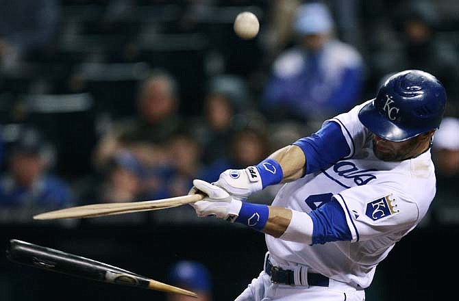 Kansas City Royals' Alex Gordon breaks his bat while fouling off a pitch during the seventh inning of a baseball game against the Baltimore Orioles in Kansas City, Mo., Tuesday, May 3, 2011. 