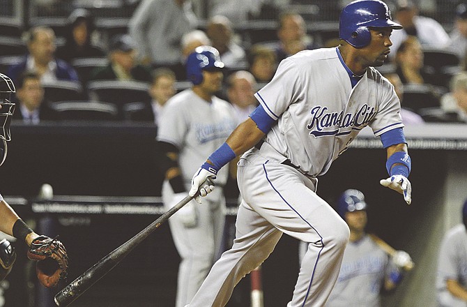 Kansas City Royals' Wilson Betemit follows through on an RBI-single during the eighth inning of a baseball game against the New York Yankees on Wednesday, May 11, 2011, at Yankee Stadium in New York. 