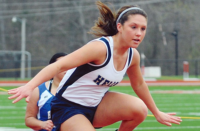 Helias' Bethany Berhorst will compete in both hurdles events at today's district meet.