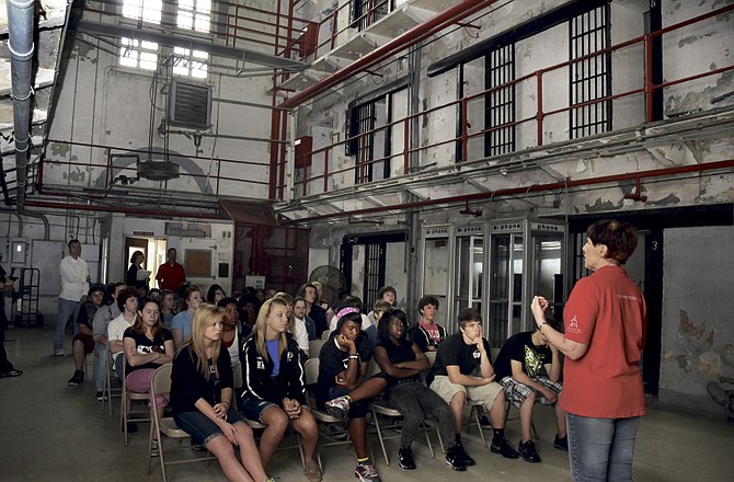 
Pam Boggs, a former corrections officer at the old Missouri State Penitentiary in Jefferson City, tells students about life in "A" Hall. Students toured the multi-story prison dorm and concluded the tour with a stop at the old gas chamber. 