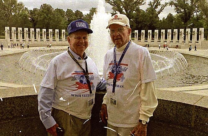 Frank Crooks, right, stands in front of the National World War II Memorial in Washington, D.C., with fellow veteran Bill Less. The two were able to visit the memorial last year as part of the Central Missouri Honor Flight Program. 