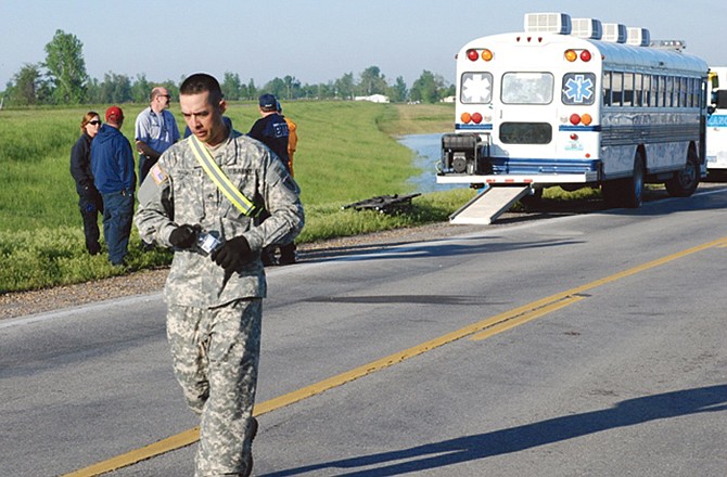 Staff Sgt. Robert Mackey works during state emergency duty for flood response in southeast Missouri.