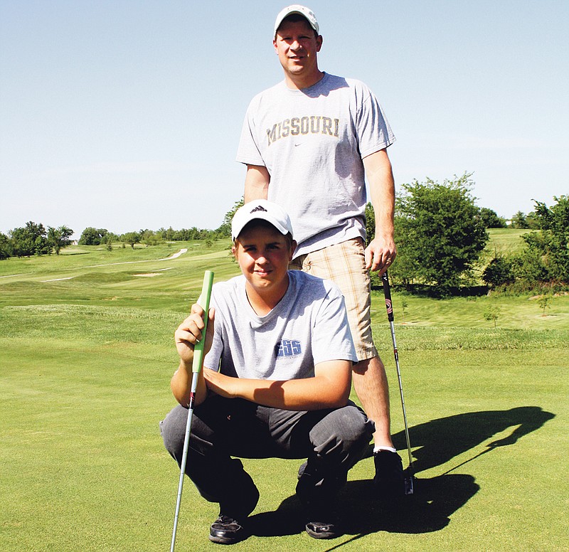 North Callaway junior Gary Wathen (foreground) - accompanied by Thunderbirds head coach Jason Smith (background) - will compete in the Class 2 state championships beginning Monday at Rivercut Golf Course in Springfield. Wathen is a first-time qualifier.