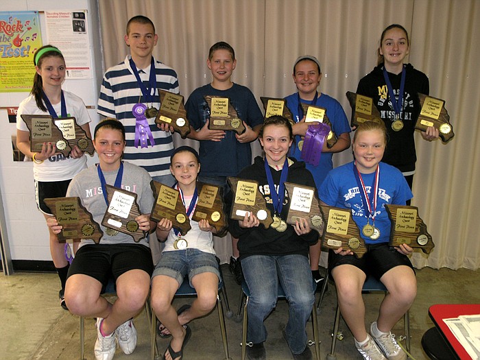 High Point students who all earned first place trophies at the State Achaeology Quest held in Springfield April 8-10; front row, from left, is Morgan Koerner (1st oral, 1st exhibit, best exhibit), Ally Harris (1st oral, 1st exhibit), Lucia Blankenship (1st oral, 1st exhibit) and Abby Harris (1st oral, 1st exhibit); back row, Halie Dampf (1st paper, 1st exhibit), David Wells (1st oral, 1st exhibit, best oral), Seth Kuda (1st exhibit), Gracie Blankenship (1st Oral, 1st Exhibit, Best 5th/6th grade oral, Missouri Archaeology Award) and Stacey Kenyon (1st oral, 1st exhibit).
