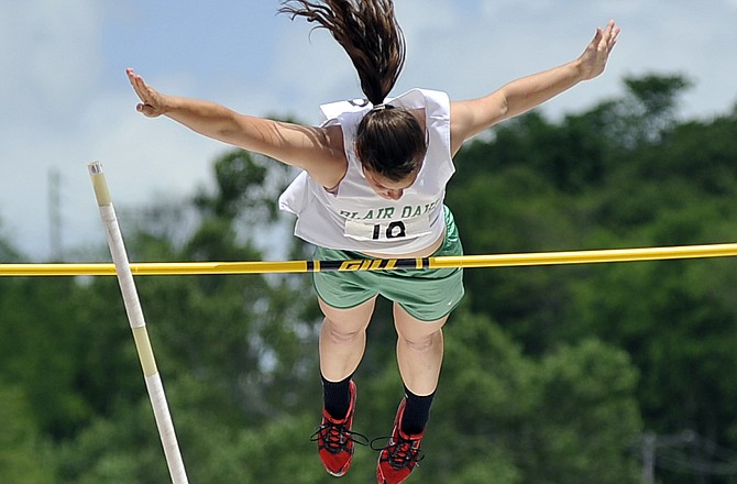 
Jessica Clark of Blair Oaks clears the bar in the Class 2 girls pole vault Saturday at Dwight T. Reed Stadium. 