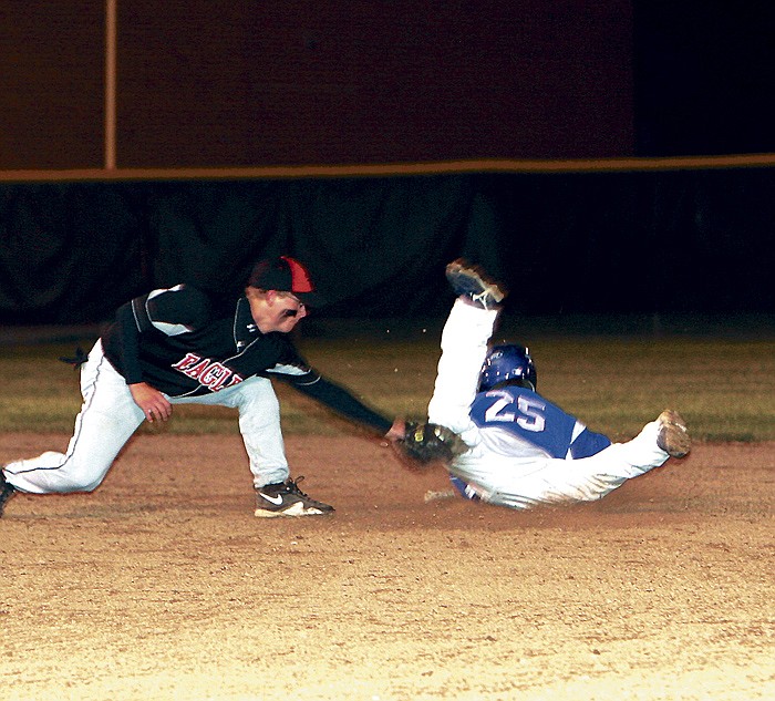 California's Alex Ludwick slides under the tag at second base to record a successful steal during the first inning of the Pintos' district opener at the Class 3 District 9 Baseball Tournament.