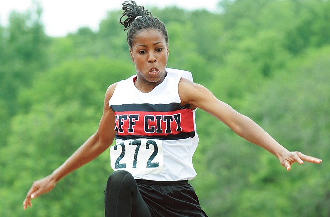 Kezia Martin of the Jefferson City Lady Jays soars toward the pit during the Class 4 girls long jump Friday. Martin, a freshman, finished second.