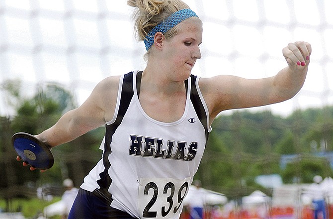 Jessica Twehous of the Lady Crusaders prepares for a throw in the girls discus. 