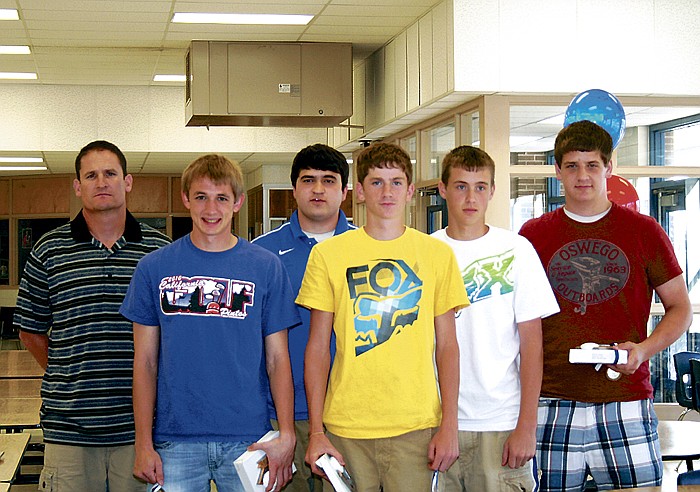 Varsity members of the 2011 California Pinto golf team who were recognized by Coach Doug Miller, far left, at the California High School Golf Banquet, from left, are Grant Burger, Brent Tuttle, Eric Birdsong, Tyler Elliott and Alec Ramsdell.