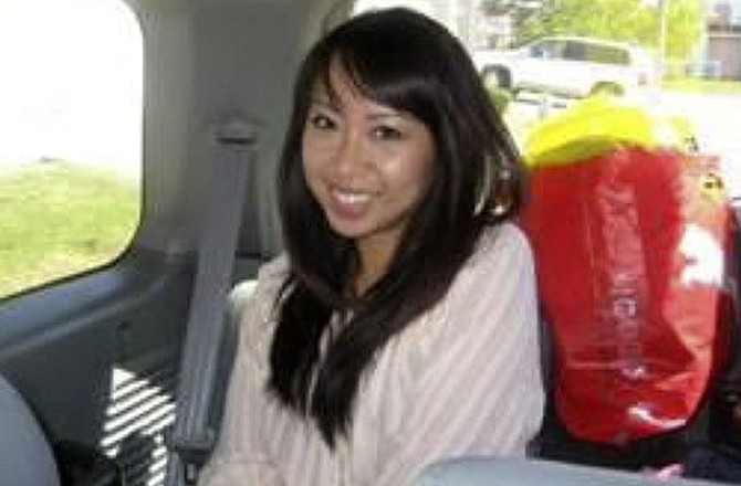 This undated handout photo provided by the Hayward Police Department whows 26-year-old female nursing student Michelle Hoang Thi Le, who disappeared Friday, May 27 from a Hayward hospital during a break in a clinical lesson. Le's family is offering a $20,000 reward for her safe return. The 26-year-old's disappearance comes 13 months after a recent nursing school graduate with the same last name disappeared outside a coffee shop in Fairfield, about 55 miles from where Michelle Le disappeared. That woman's body was found 12 days later, and the case remains unsolved.