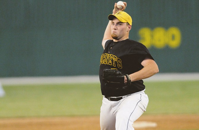 St. Elizabeth starting pitcher Austin Rehagen works to the plate during Thursday night's Class 1 third-place game against Oran in Springfield.