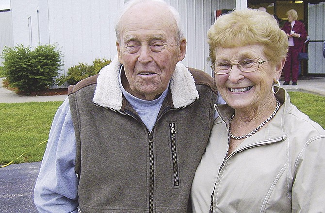 Pete and Lorraine Adkins are shown May 26 after a memorial service at Hawthorn Memorial Gardens in Jefferson City. 