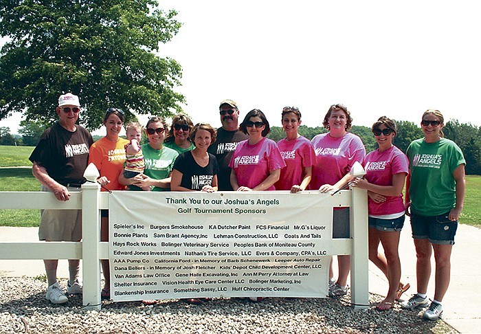 Family members and friends of Josh Fletcher, including members of Joshua's Angels Relay for Life team, were present for the team's annual Relay for Life three-person scramble fundraiser Friday at the California Country Club. Some who gathered around the sign posted in appreciation of the sponsors of the golf tournament, from left, are Bob Keil, Josh's grandfather; Lauren Mouse Lawson, Josh's cousin; Heather Fletcher, Josh's sister-in-law, holding daughter Addison Fletcher, Josh's niece; Ann and Keith Fletcher, Josh's parents (behind); Allison Kruger, Penny Harris, Barbie Rudder, Amber Bolin, Josh's sister Callie Fletcher, and Shauna Healea.