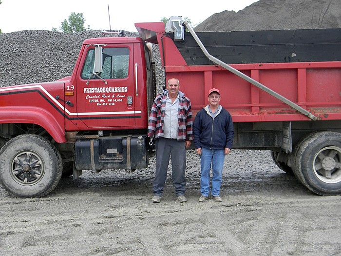 Prestage Quarries, Inc., Owner Gary Milligan, right, with truck driver Donnie Wright.