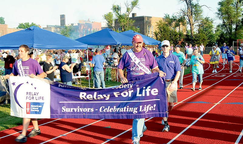 Participants of Callaway County's Relay for Life event march around the track at the Missouri School for the Deaf at a past year's event. This year's Relay for Life run will start at 6 p.m. Friday and last until 6 a.m. Saturday.