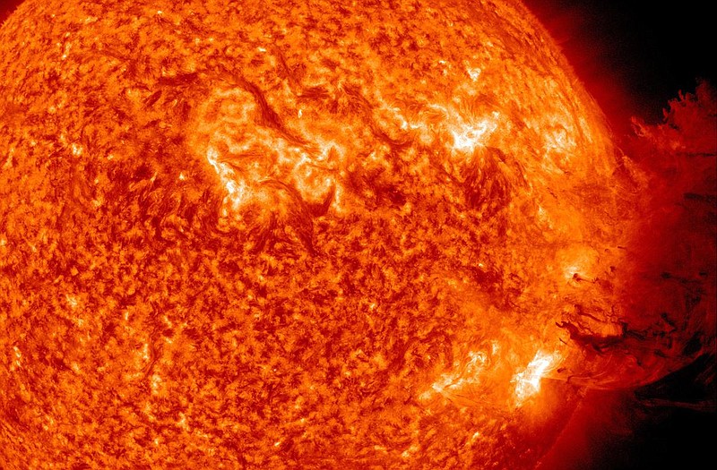 A medium-sized solar flare erupted from the sun in an impressive display captured by NASA cameras. Scientists say that the event won't have a significant impact on Earth. NASA says the flare peaked Tuesday and created a large cloud that appeared to cover almost half the surface of the sun.