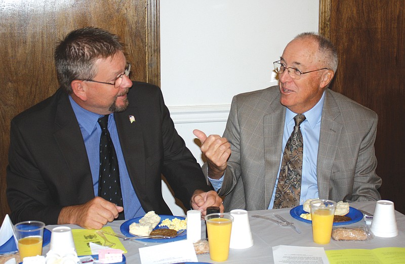 (Right) Fulton Mayor LeRoy Benton chats with previous mayor Charlie Latham at the Mayor's Prayer Breakfast held Thursday morning at the Callaway County Senior Center. The event was a fundraiser for the center.