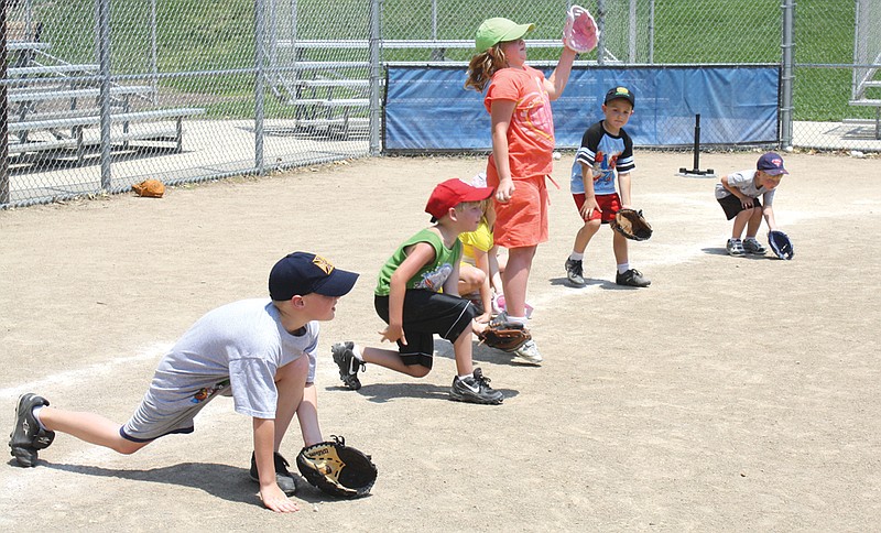 Home-school children practice their tee ball skills at Veterans Park. Tee ball is one of the activities offered through the Kingdom Homeschoolers group.