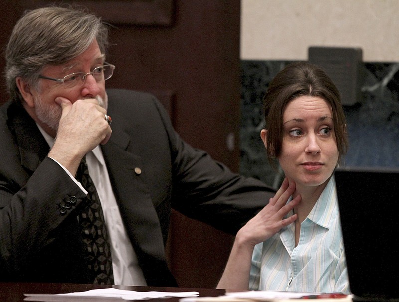 Casey Anthony, right, with defense attorney Cheney Mason, listens to proceedings during her murder trial Wednesday, at the Orange County Courthouse, in Orlando, Fla.