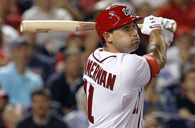 Washington Nationals' Ryan Zimmerman watches his RBI-double during the seventh inning of a baseball game against the St. Louis Cardinals in Washington, Tuesday, June 14, 2011. The Nationals beat the Cardinals 8-6. 
