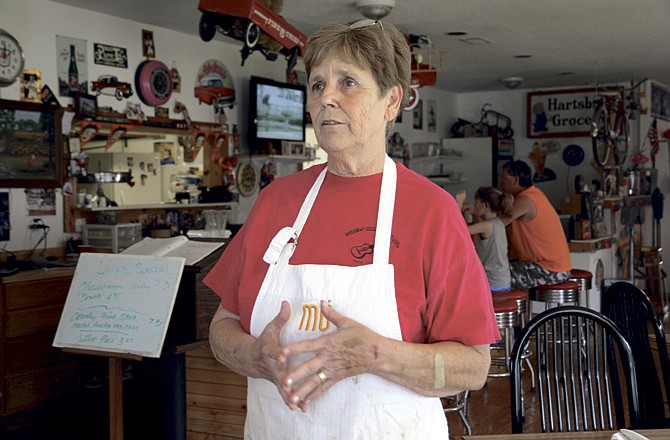 Dotty Manns, owner of Dotty's Cafe in Hartsburg, talks about the impact of the possible impending flood. She says many people think the area is already flooded and are staying away.