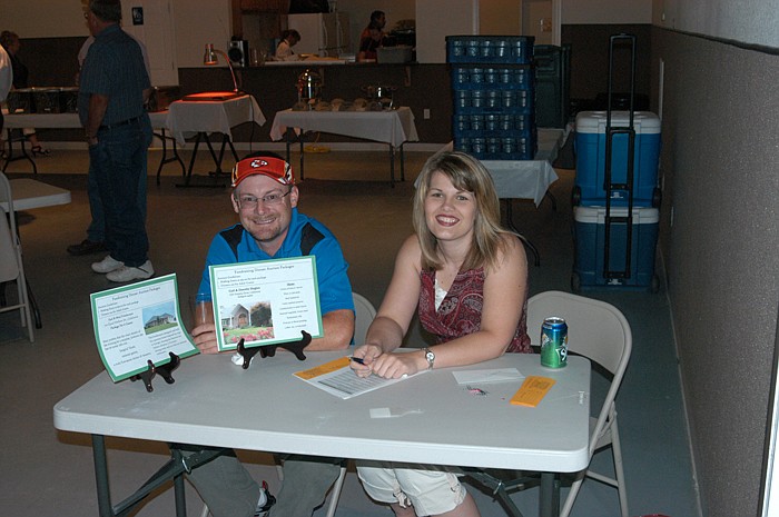 Chad and Sarah Holtsclaw at the ticket table at the CPI event held Saturday, June 18.