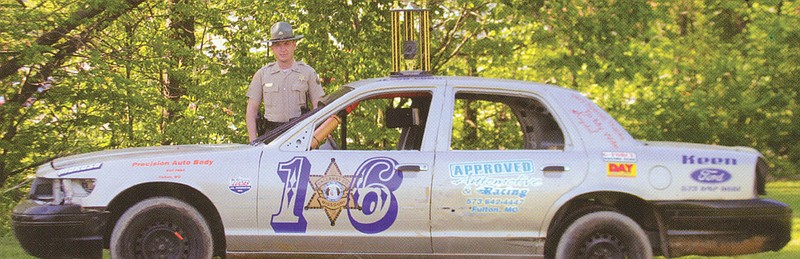 Deputy Jason Conn of the Callaway County Sheriff's Department will race an old patrol car in the Battle for the Badges Race on July 23.