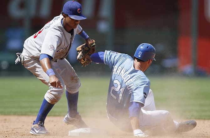 Kansas City Royals' Jeff Francoeur (21) is tagged out by Chicago Cubs shortstop Starlin Castro (13) as he tries to steal second in the eighth inning during a baseball game, Sunday, June 26, 2011, in Kansas City, Mo. The Royals won 6-3. 