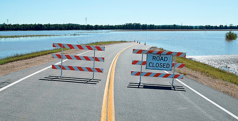 During previous heavy flooding along the Missouri River, Missouri 94 in Callaway County becomes a road to nowhere when high water covers the roadway. Callaway County officials are making plans to deal with similar severe flooding this summer.