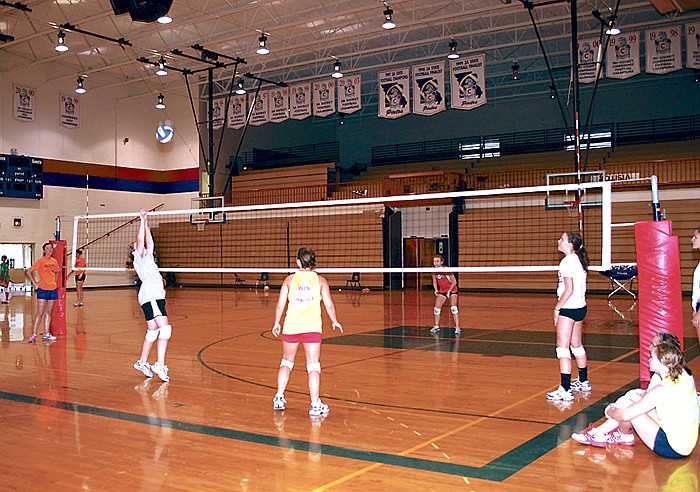 Girls attending the session for grades 9-12 at the California High School Summer Volleyball Camp Wednesday, June 22, brush up on their skills with direction from CHS Assistant Coach Tammy Reynolds.