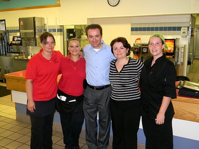 Employees at Mel's Diner; from left, are Stacey Gunn, Amanda Thrasher, Mel and Naz Veliu and Tabitha Montgomery.