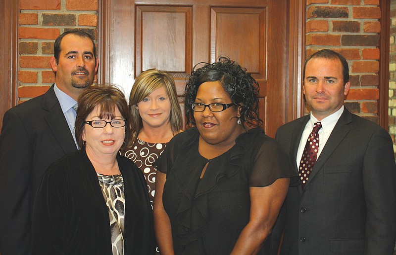 Crystal Morris (second from right) joins the team at Maupin Funeral Home to complete her funeral director apprenticeship. The Maupin team includes (left back) James Wagoner, pre-need agent; Lisa Wagoner, office manager; (front left) Melody Craighead, funeral director; and (far right) Derek Ebersole, funeral director.