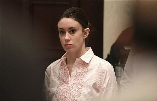 Casey Anthony stands for the arrival of the jury at the start of the second day of jury deliberations in her murder trial at the Orange County Courthouse in Orlando, Fla.,Tuesday, July 5, 2011.