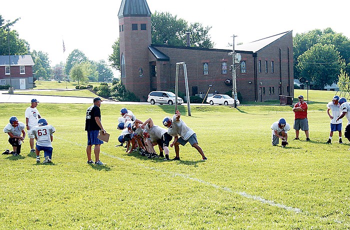 Boys in grades 9-12 attending the California High School Football Camp last week got a workout Wednesday, June 29 as temperatures soared in the 90's during their two-hour afternoon camp session. 