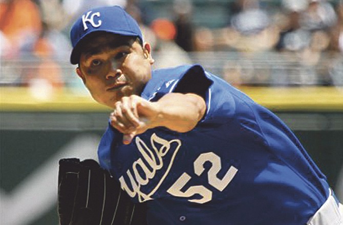 Kansas City Royals starting pitcher Bruce Chen delivers during the first inning of a baseball game against the Chicago White Sox Wednesday, July 6, 2011 in Chicago.