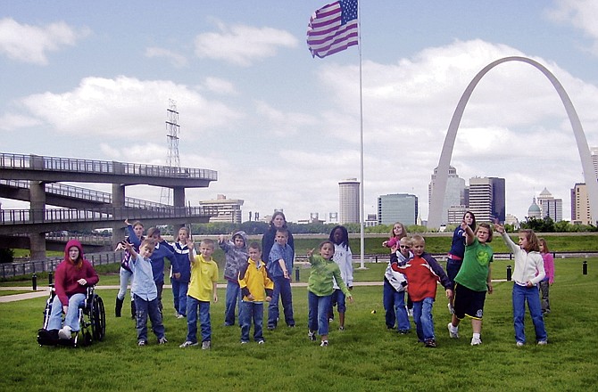 After learning the music and hand motions, nearly 20 children from Central United Church of Christ recorded a performance with the Gateway Arch in the background. 