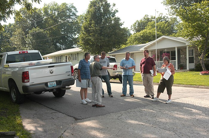 During the sidewalk project walk-through on July 5, Bob Gilbert, Bartlett and West Engineering, points out on Kelly Street where some of the work will be done on the new Oak Street sidewalk in California. Others present are, from left, Water and Wastewater Supervisor Kyle Wirts, Ward III Alderman Lanny Ash, Mayor Norris Gerhart, Ward II Alderman Cameron Freiner and Ward III Alderwoman Carol Rackers.