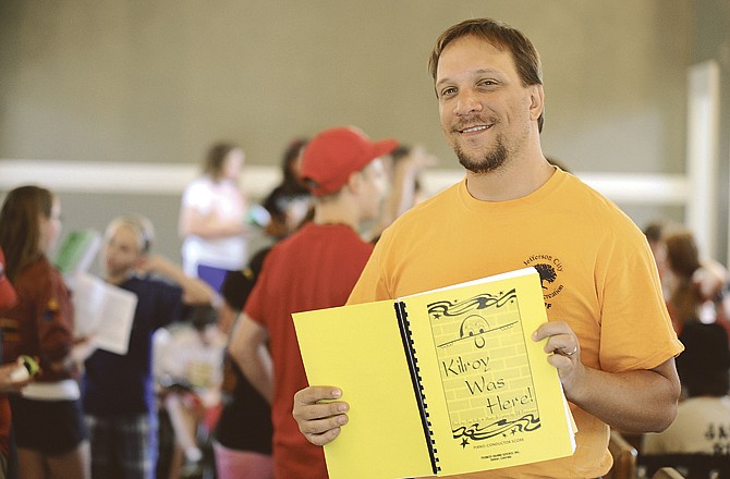 Troy Donehue pauses from a directing a play rehearsal to pose for a photograph. Donehue oversees the Jefferson City Parks and Recreation Department's Theater Camp each summer, and is working with students for their upcoming production of "Kilroy Was Here."