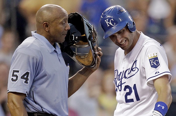 The Royals' Jeff Francoeur argues a strike call with home plate umpire CB Bucknor during the fifth inning Monday against the White Sox.