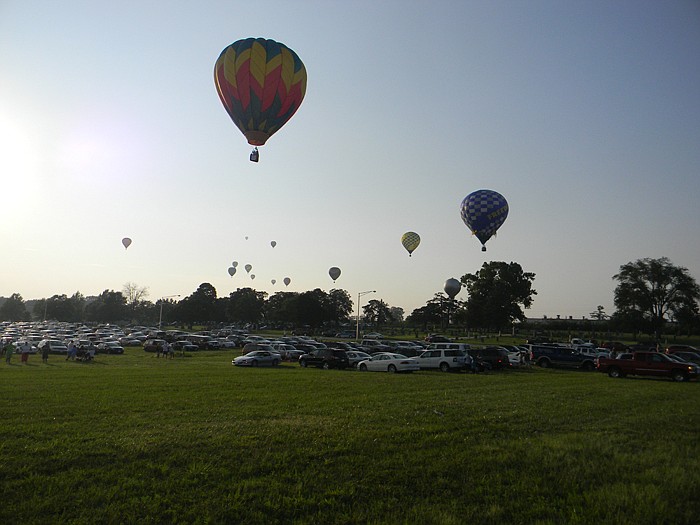 Balloons compete and try to be first to chase down the hare during the California Balloon Invitational.