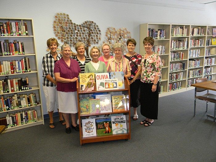 Wood Place Public Library Director Connie Walker with a group of Moniteau County retired teachers who matched a Libri Foundation Grant resulting in $1400 worth of books being donated to the library.