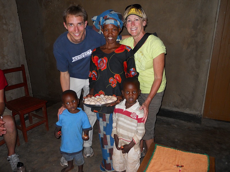 Recent Westminster College graduate Graeme Cave and travel team member Kathy Ritter were able to visit with micro-loan recipient Alphonsine during a trip in May. Thanks to the loan from the Rwanda Community Partnership Project, Alphonsine now is able to support her eight children by selling eggs and chickens. 