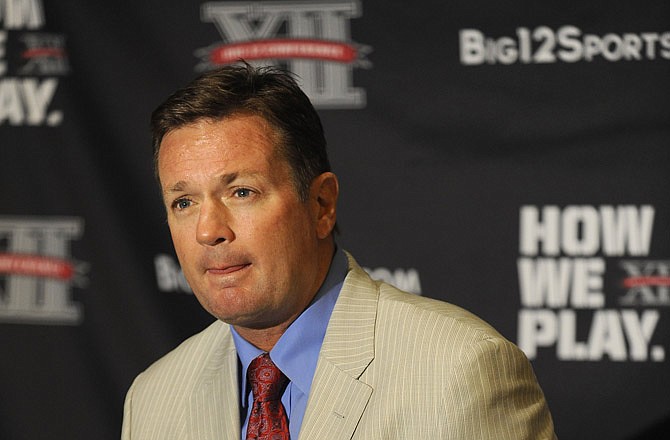 Oklahoma coach Bob Stoops answers questions Tuesday during Big 12 Media Days in Dallas.