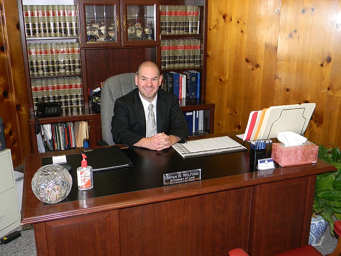 Bryan W. Wolford, attorney at law, poses in this July 2011 photo at his office at 604 South Thomas Street, California.