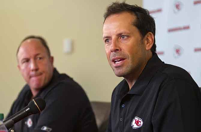 Kansas City Chiefs coach Todd Haley speaks Tuesday, July 26, 2011, in Kansas City, Mo., about the changes to the beginning of the NFL football team's summer training camp in St. Joseph, Mo. At left is Chiefs general manager Scott Pioli. (AP Photo/The Kansas City Star, David Eulitt)