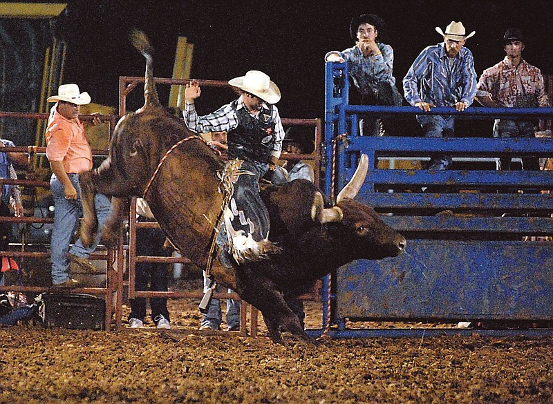 This bull ride in 2008 was one of the last appearances of a rodeo at the Callaway County Fair. The traditional event will be back in Callaway at 7 p.m. Aug. 6 in the little arena at the Callaway County Fairgrounds.