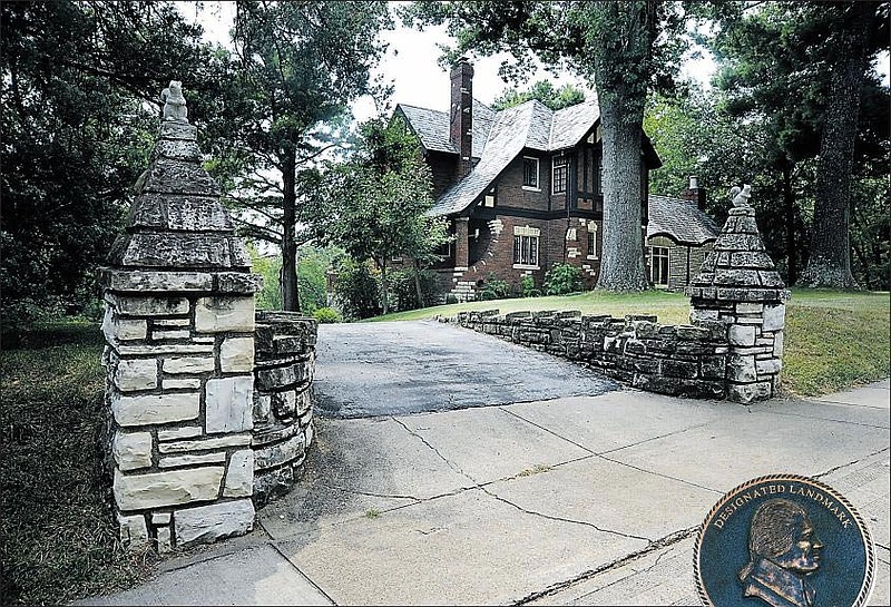 The original pillars that form the driveway entrance still stand nearly 80 years after the home at 1005 Adams St. was built.