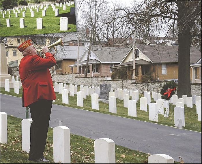 ABOVE: Greg Craig played Taps at the National Cemetery on East McCarty Street in December 2009 as Wreaths Across America laid wreaths for all six branches of military service and the POW/MIAs in a simultaneous event across the United States.